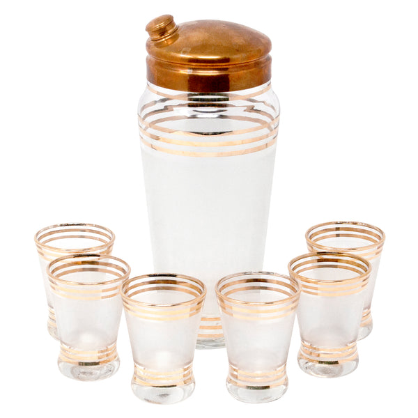 http://thehourshop.com/cdn/shop/products/13472-Vintage-Art-Deco-Frosted-Gold-Band-Cocktail-Shaker-Glasses-Set_grande.jpg?v=1596663642