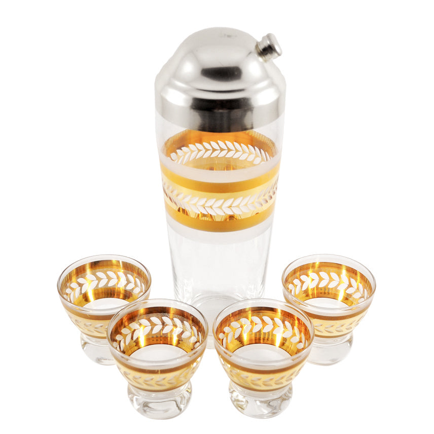 https://thehourshop.com/cdn/shop/products/13503-Vintage-Etched-Laurel-Gold-Frosted-Cocktail-Shaker-Glasses-Set_1280x1280.jpg?v=1596664290